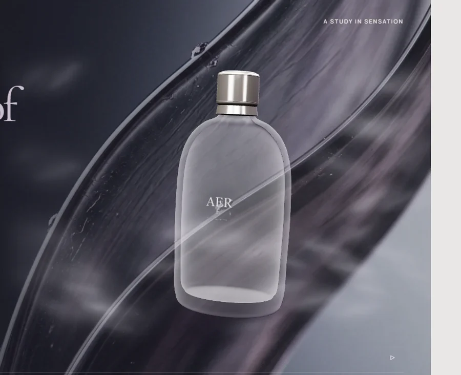 AER perfume: smoky plum glass, ivory label, platinum atomizer